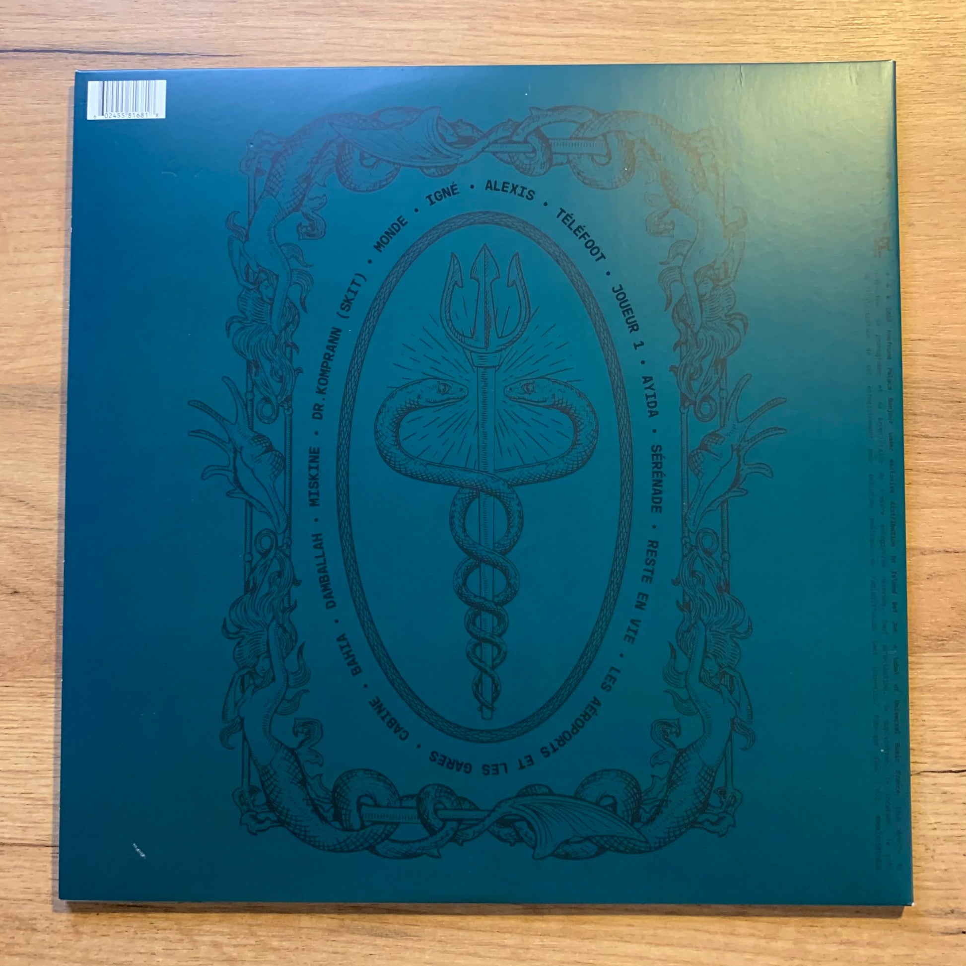 Luidji - Tristesse Business Saison 00 - Pochette verso bleu pétrole