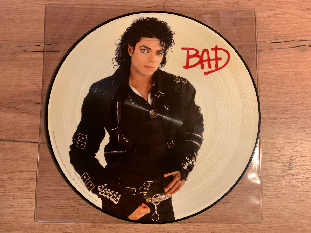 Seconde face illustrée du picture disc avec silhouettes dansantes